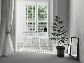 Mini Blinds | Concord Blinds & Shades CA Detailed view of mini blinds installed in a home, showcasing elegance and functionality.